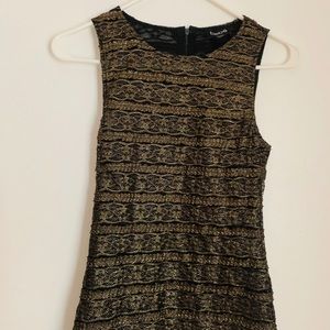 Bebe gold & black lace top